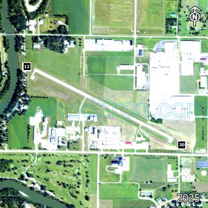 Aerial image of the airport with runways marked.