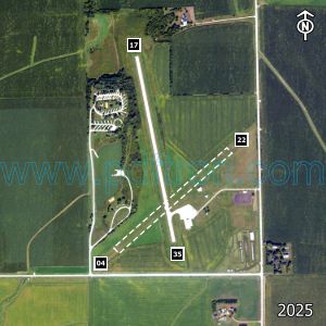 Aerial image of the airport with runways marked.