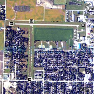 Aerial image of the airport with runways marked.