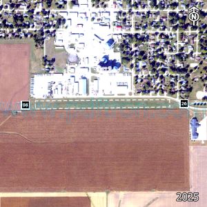 Aerial image of the airport with runways marked.