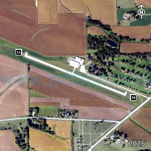 Aerial image of the airport with runways marked.