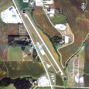 Aerial image of the airport with runways marked.