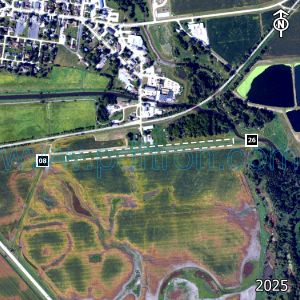 Aerial image of the airport with runways marked.