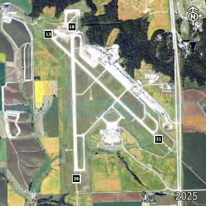 Aerial image of the airport with runways marked.