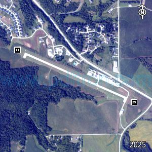 Aerial image of the airport with runways marked.