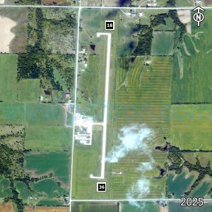 Aerial image of the airport with runways marked.