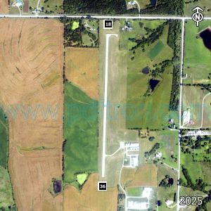 Aerial image of the airport with runways marked.