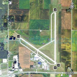 Aerial image of the airport with runways marked.