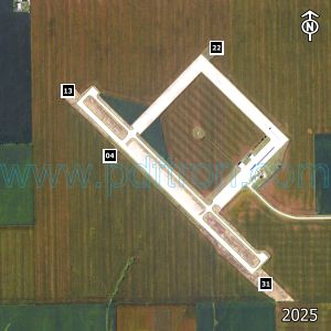 Aerial image of the airport with runways marked.