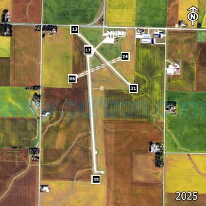 Aerial image of the airport with runways marked.
