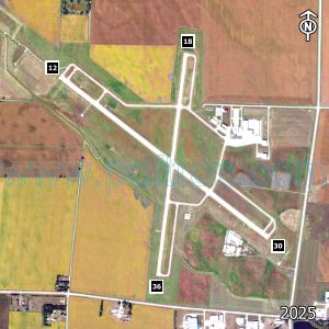 Aerial image of the airport with runways marked.